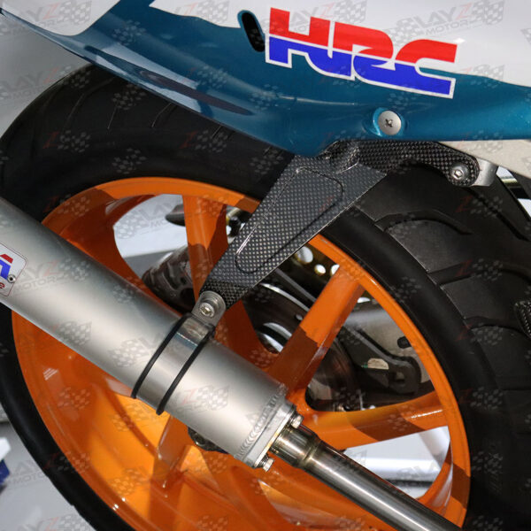 Second image of TYGA Exhaust Hanger Stay Carbon - NSR 150 SP